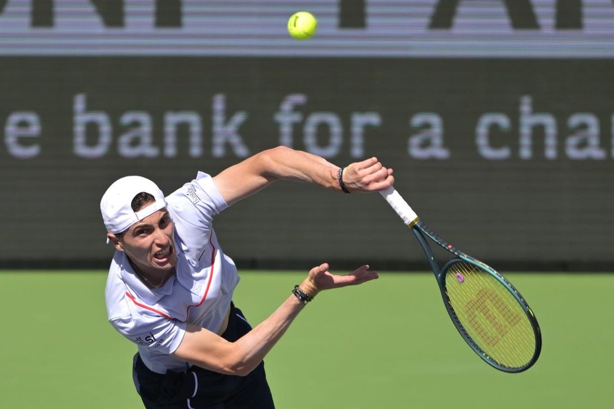Mar 11, 2024; Indian Wells, CA, USA; Ugo Humbert (FRA) hits a shot in his third round match against Tommy Paul (USA) in the BNP Paribas Open at the Indian Wells Tennis Garden. Mandatory Credit: Jayne Kamin-Oncea-USA TODAY Sports