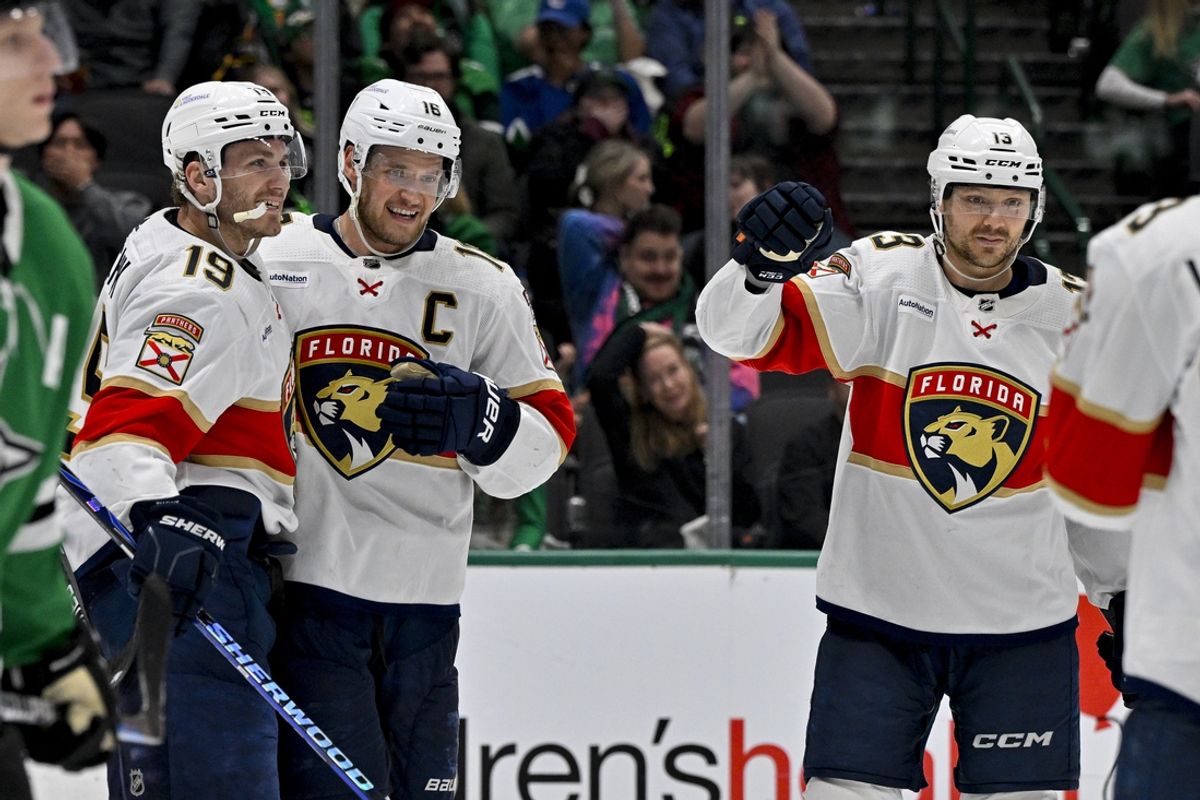 Mar 12, 2024; Dallas, Texas, USA; Florida Panthers left wing Matthew Tkachuk (19) and center Aleksander Barkov (16) and center Sam Reinhart (13) after Barkov scores the game winning goal against the Dallas Stars during the third period at the American Airlines Center. Mandatory Credit: Jerome Miron-Imagn Images