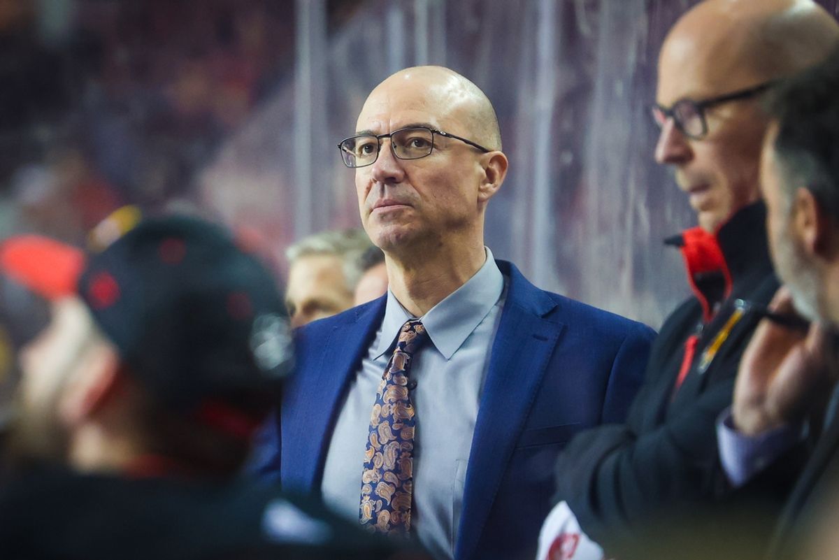 Mar 12, 2024; Calgary, Alberta, CAN; Calgary Flames head coach Ryan Huska on his bench against the Colorado Avalanche during the third period at Scotiabank Saddledome. Mandatory Credit: Sergei Belski-Imagn Images