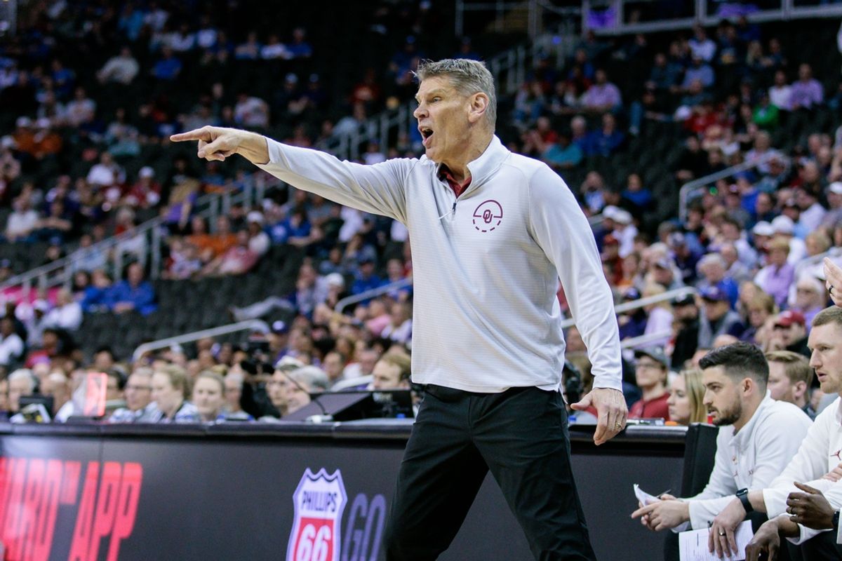 Mar 13, 2024; Kansas City, MO, USA; Oklahoma Sooners coach Porter Moser reacts to a play during the first half against the TCU Horned Frogs at T-Mobile Center. Mandatory Credit: William Purnell-Imagn Images
