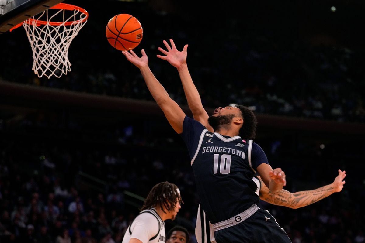 Mar 13, 2024; New York City, NY, USA;  Georgetown Hoyas guard Jayden Epps (10) drives on Providence Friars guard Devin Carter (22) during the second half at Madison Square Garden. Mandatory Credit: Robert Deutsch-Imagn Images