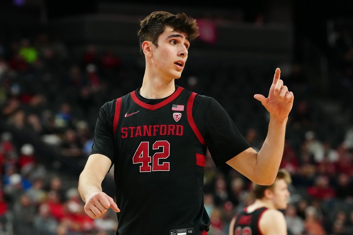 Mar 13, 2024; Las Vegas, NV, USA; Stanford Cardinal forward Maxime Raynaud (42) talks to a team mate on the bench before a California Bears free throw attempt during the first half at T-Mobile Arena. Mandatory Credit: Stephen R. Sylvanie-Imagn Images
