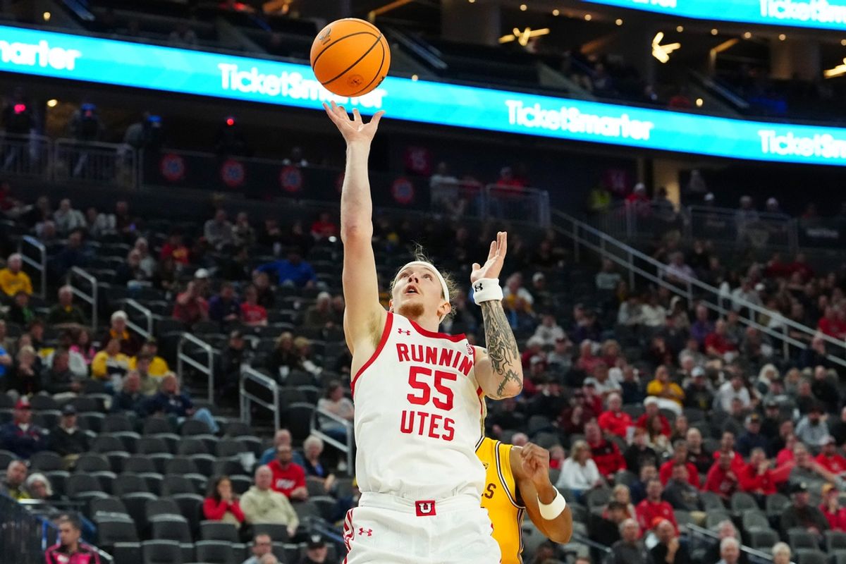 Mar 13, 2024; Las Vegas, NV, USA; Utah Utes guard Gabe Madsen (55) shoots against the Arizona State Sun Devils during the first half at T-Mobile Arena. Mandatory Credit: Stephen R. Sylvanie-Imagn Images