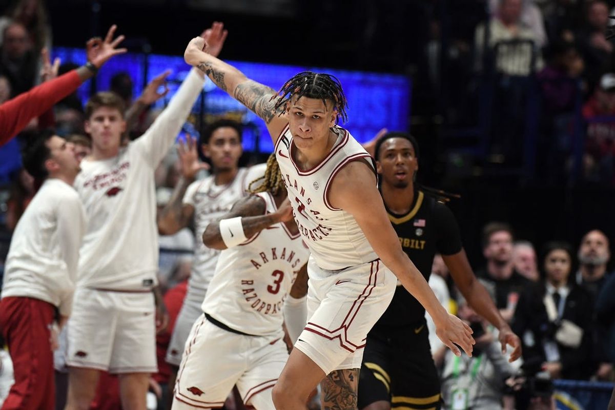 Mar 13, 2024; Nashville, TN, USA; Arkansas Razorbacks forward Trevon Brazile (2) celebrates after a basket in overtime against the Vanderbilt Commodores at Bridgestone Arena. Mandatory Credit: Christopher Hanewinckel-USA TODAY Sports