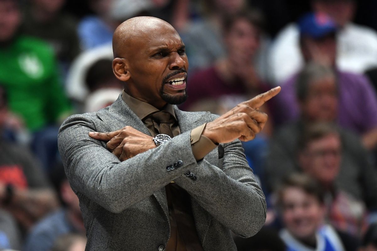 Mar 13, 2024; Nashville, TN, USA; Vanderbilt Commodores head coach Jerry Stackhouse yells from the bench in overtime against the Arkansas Razorbacks at Bridgestone Arena. Mandatory Credit: Christopher Hanewinckel-Imagn Images