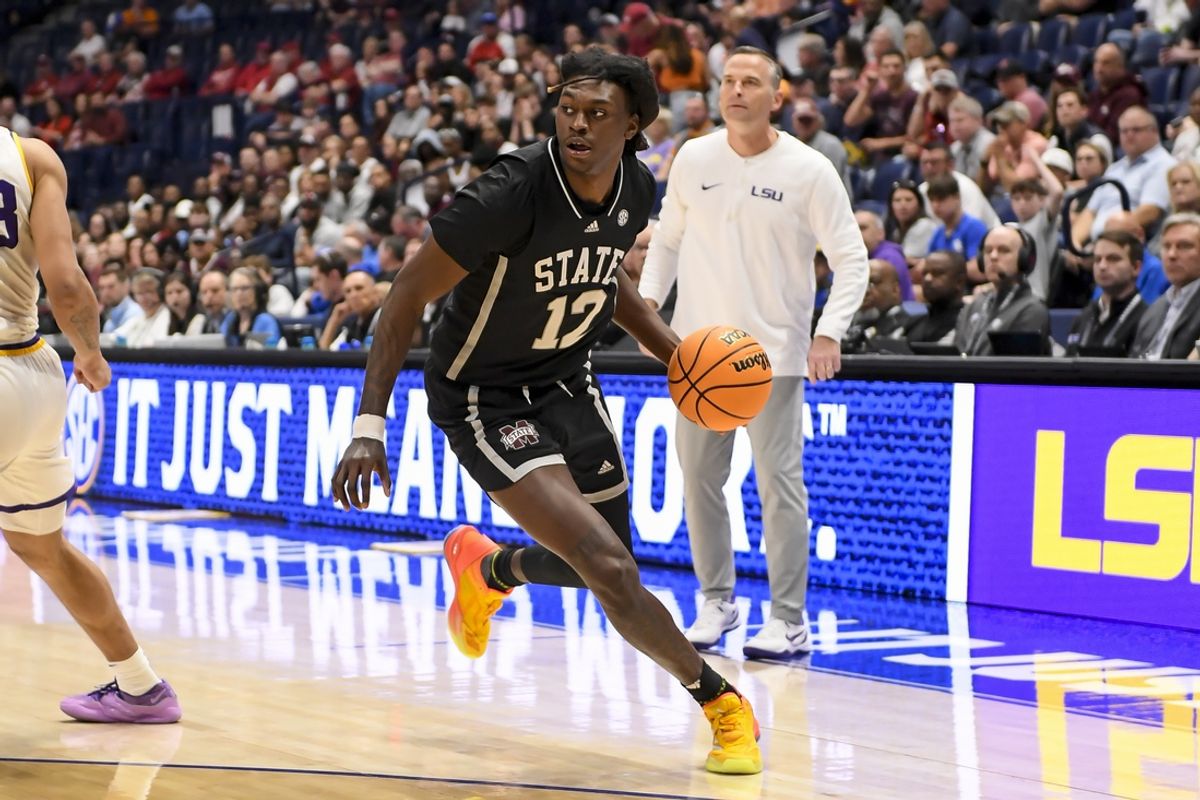Mar 14, 2024; Nashville, TN, USA;  Mississippi State Bulldogs forward KeShawn Murphy (12) \dribbles against the LSU Tigers during the first half at Bridgestone Arena. Mandatory Credit: Steve Roberts-Imagn Images