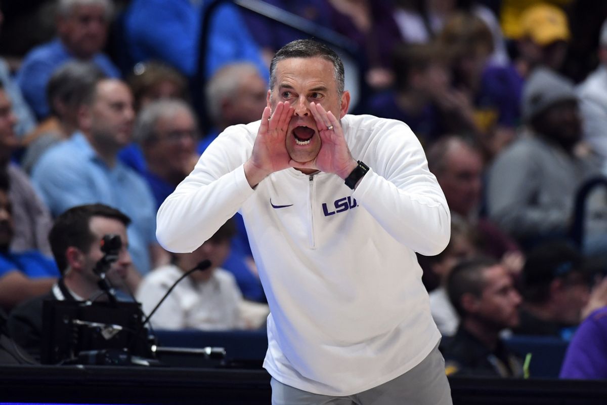 Mar 14, 2024; Nashville, TN, USA; LSU Tigers head coach Matt McMahon yells from the sideline during the second half against the Mississippi State Bulldogs at Bridgestone Arena. Mandatory Credit: Christopher Hanewinckel-Imagn Images
