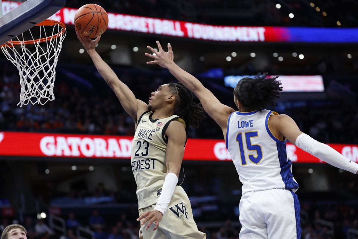 Mar 14, 2024; Washington, D.C., USA; Wake Forest Demon Deacons guard Hunter Sallis (23) shoots the ball as Pittsburgh Panthers guard Jaland Lowe (15) defends in the second half at Capital One Arena. Mandatory Credit: Geoff Burke-Imagn Images