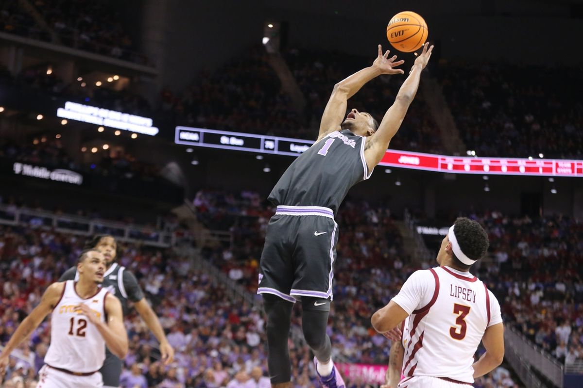 Kansas State senior forward David N'Guessan (1) reaches for a rebound against Iowa State in the first half of the quarterfinal round in the Big 12 Tournament inside the T-Mobile Center in Kansas City, Mo.