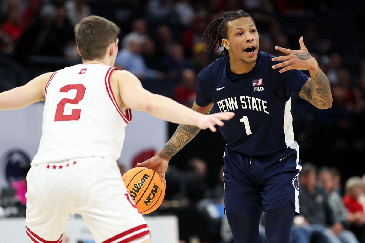 Mar 14, 2024; Minneapolis, MN, USA; Penn State Nittany Lions guard Ace Baldwin Jr. (1) calls a play as Indiana Hoosiers guard Gabe Cupps (2) defends during the second half at Target Center. Mandatory Credit: Matt Krohn-Imagn Images