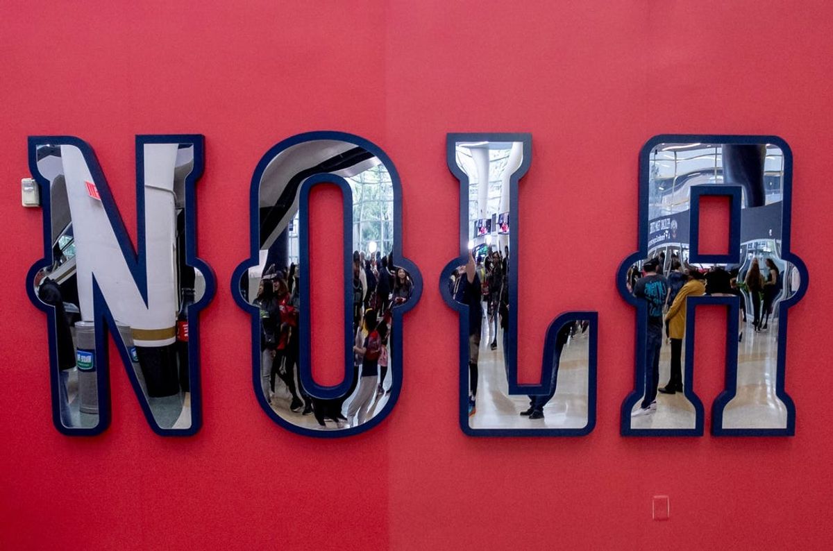 Mar 15, 2024; New Orleans, Louisiana, USA;  Detailed view of the NOLA mirror logo as fans arrive before a game between the New Orleans Pelicans and the LA Clippers at Smoothie King Center. Mandatory Credit: Stephen Lew-USA TODAY Sports