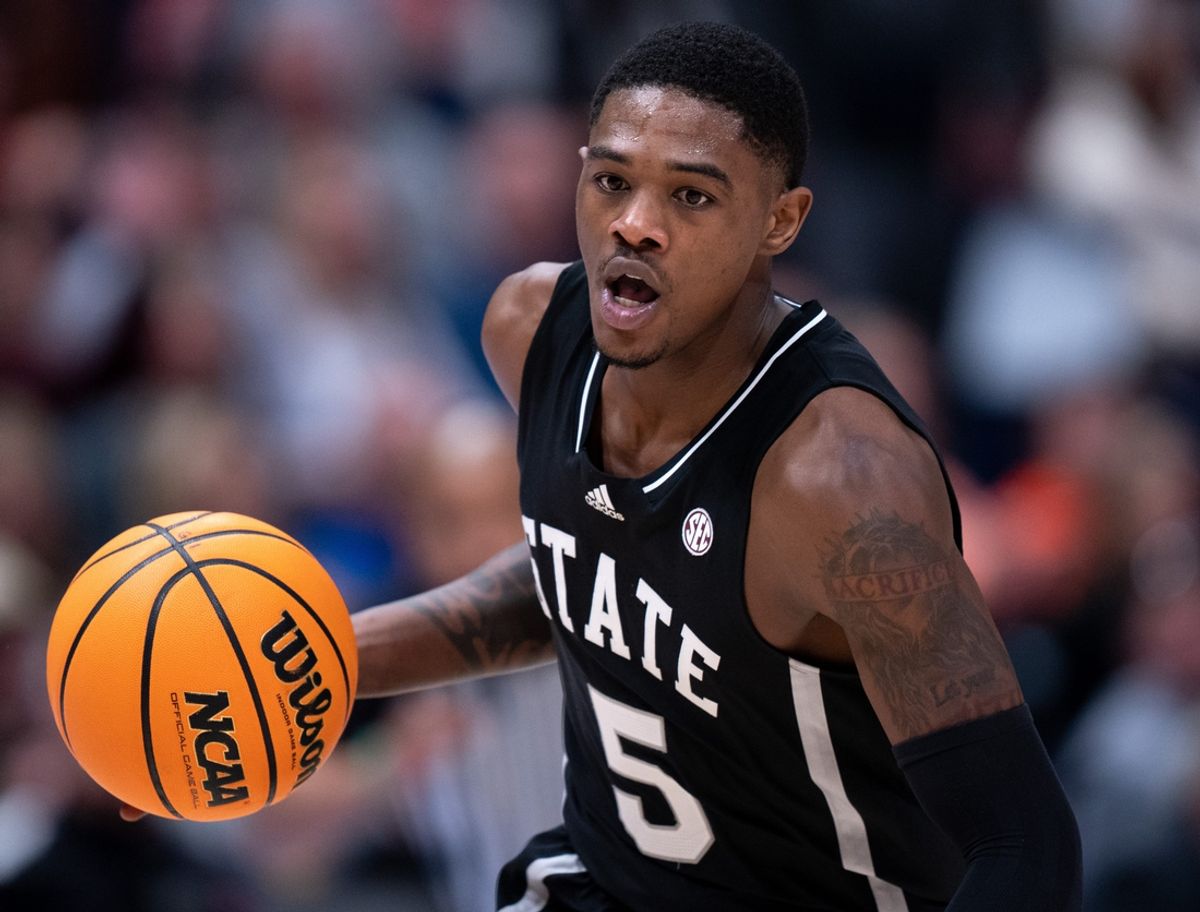 Mississippi State Bulldogs guard Shawn Jones Jr. (5) brings the ball up court against Auburn Tigers during their SEC Men's Basketball Tournament semifinal game at Bridgestone Arena in Nashville, Tenn., Saturday, March 16, 202 at Bridgestone Arena in Nashville, Tenn., Saturday, March 16, 2024.