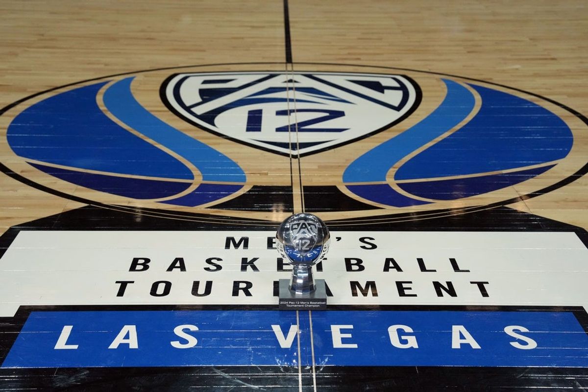 Mar 16, 2024; Las Vegas, NV, USA; The 2024 Pac-12 Conference men's basketball champion trophy at center court on the Pac-12 logo at T-Mobile Arena. Mandatory Credit: Kirby Lee-Imagn Images