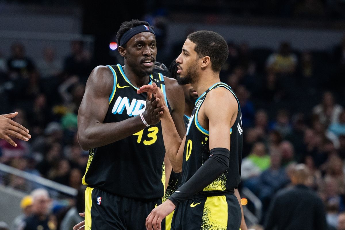 Mar 16, 2024; Indianapolis, Indiana, USA;  Indiana Pacers forward Pascal Siakam (43) celebrates with guard Tyrese Haliburton (0) in the first half against the Brooklyn Nets at Gainbridge Fieldhouse. Mandatory Credit: Trevor Ruszkowski-Imagn Images