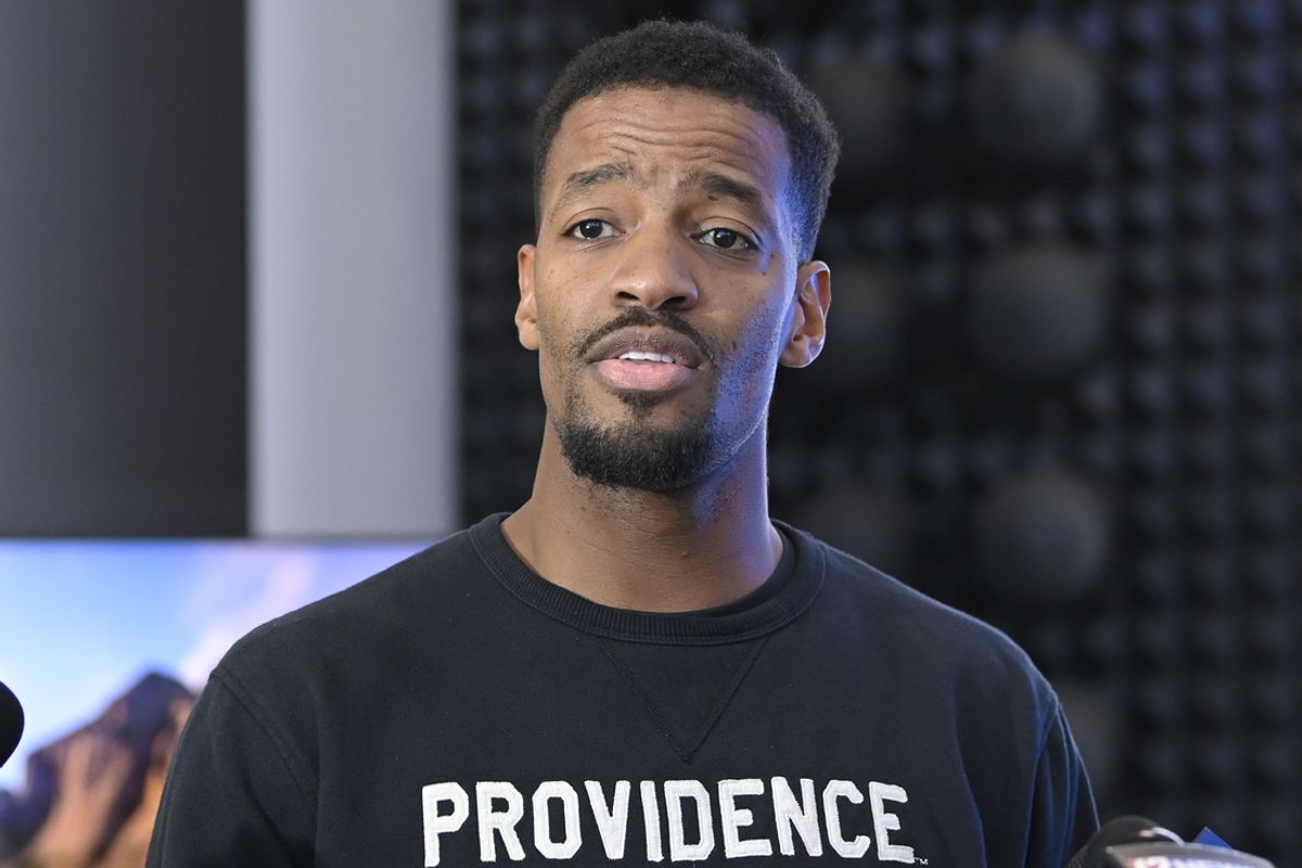 Mar 17, 2024; Providence, RI, USA;  Providence College men's basketball coach Kim English speaks to media following the NCAA March Madness bracket announcements at the Ruane Friar Development Center. Mandatory Credit: Eric Canha-Imagn Images