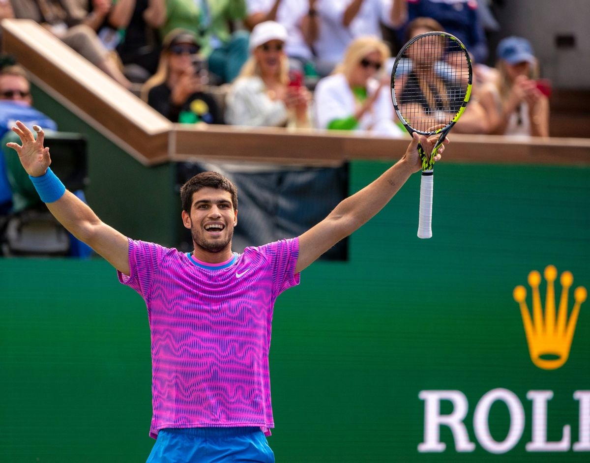 Carlos Alcaraz celebrates the match point over Daniil Medvedev during the ATP final of the BNP Paribas Open in Indian Wells, Calif., Sunday, March 17, 2024.