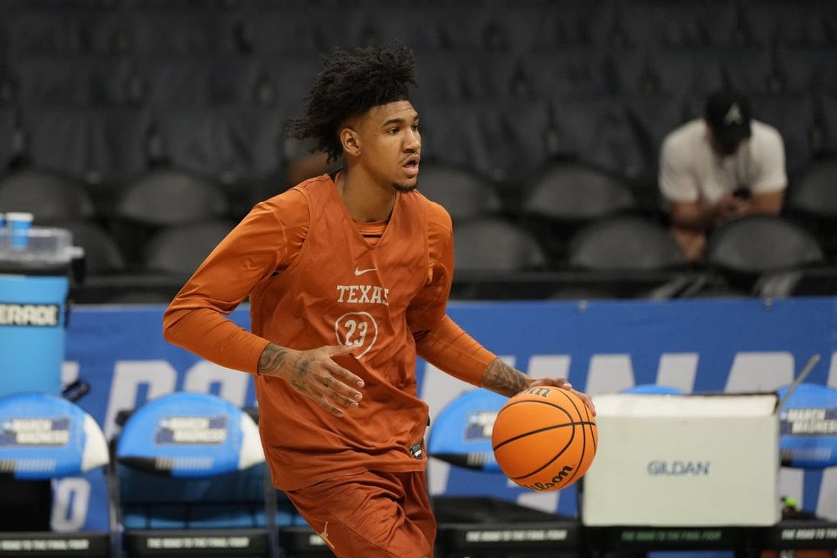 Mar 20, 2024; Charlotte, NC, USA; Texas Longhorns forward Dillon Mitchell (23) during practice at Spectrum Center. Mandatory Credit: Bob Donnan-USA TODAY Sports
