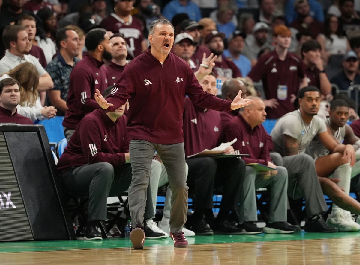 March 21, 2024, Charlotte, NC, USA; Mississippi State Bulldogs head coach Chris Jans reacts against the Michigan State Spartans  in the first round of the 2024 NCAA Tournament at the Spectrum Center. Mandatory Credit: Jim Dedmon-Imagn Images