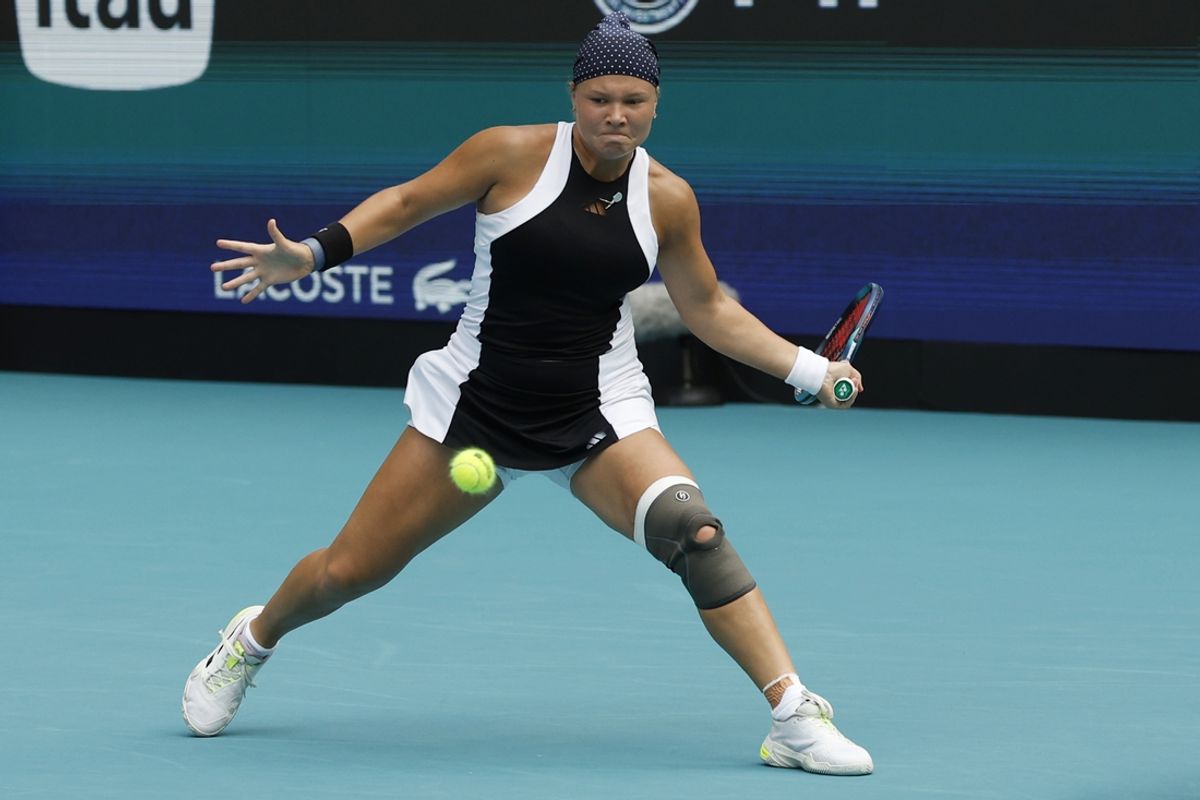 Mar 21, 2024; Miami Gardens, FL, USA; Diana Shnaider hits a forehand against Madison Keys (USA) (not pictured) on day four of the Miami Open at Hard Rock Stadium. Mandatory Credit: Geoff Burke-USA TODAY Sports