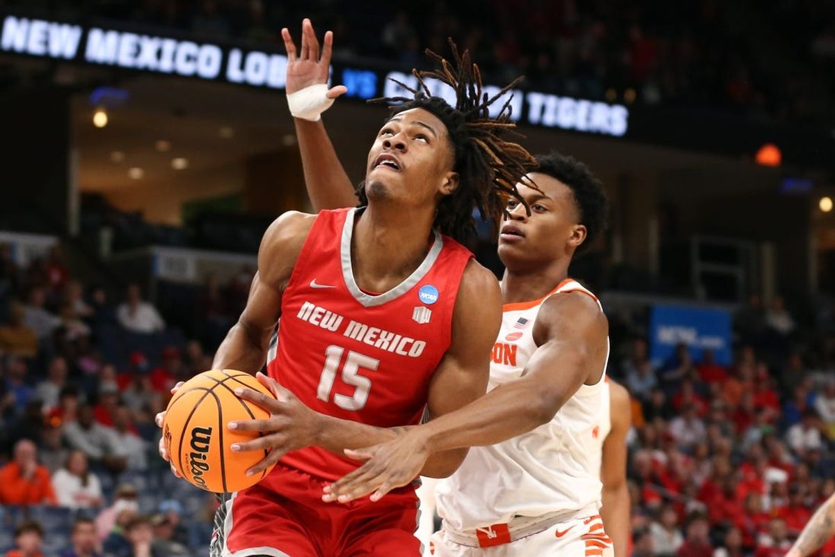 Mar 22, 2024; Memphis, TN, USA;  New Mexico Lobos forward JT Toppin (15) shoots against the Clemson Tigers during the first half of the NCAA Tournament First Round at FedExForum. Mandatory Credit: Petre Thomas-USA TODAY Sports