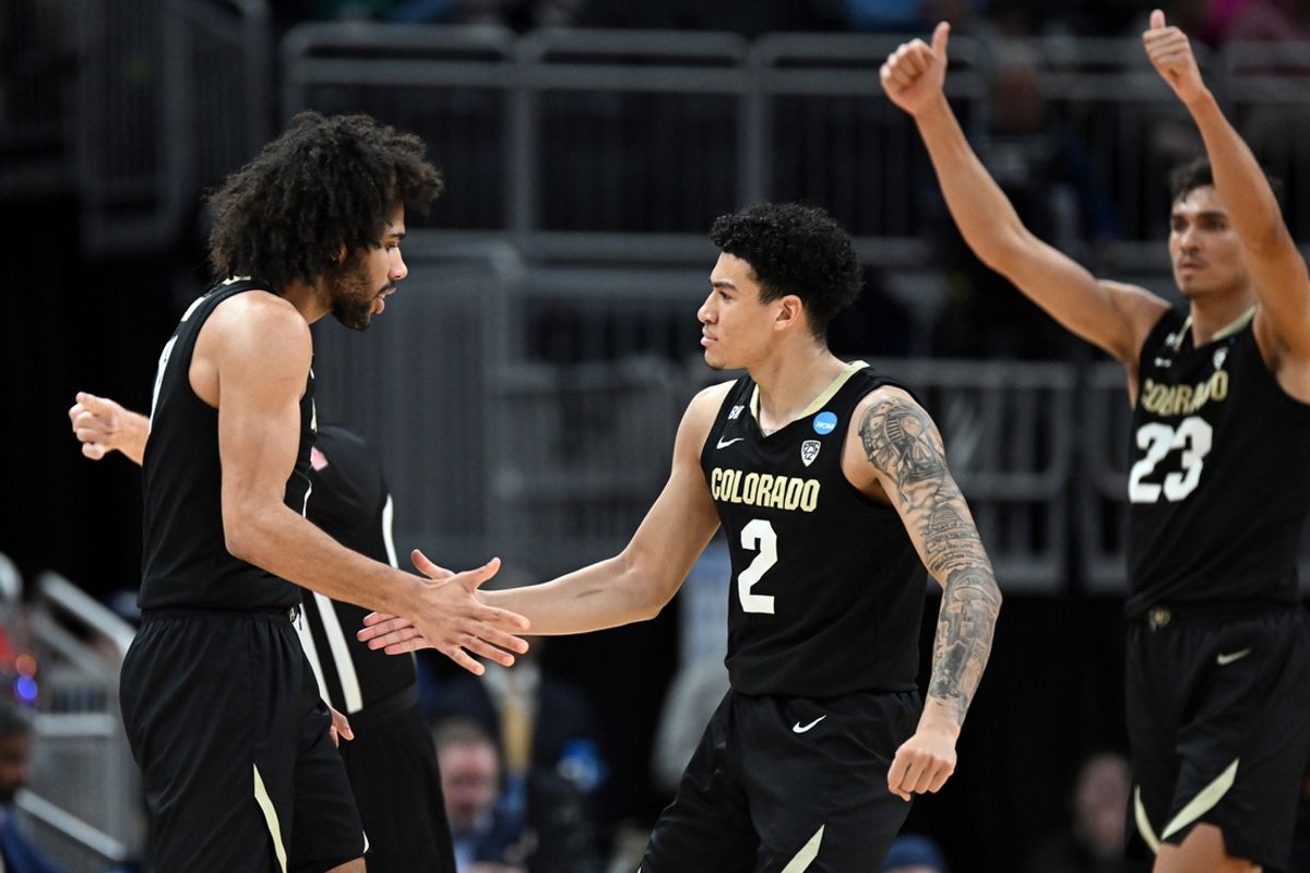 Mar 22, 2024; Indianapolis, IN, USA; Colorado Buffaloes guard KJ Simpson (2) and guard Javon Ruffin (11) react in the first half against the Florida Gators in the first round of the 2024 NCAA Tournament at Gainbridge FieldHouse. Mandatory Credit: Robert Goddin-Imagn Images