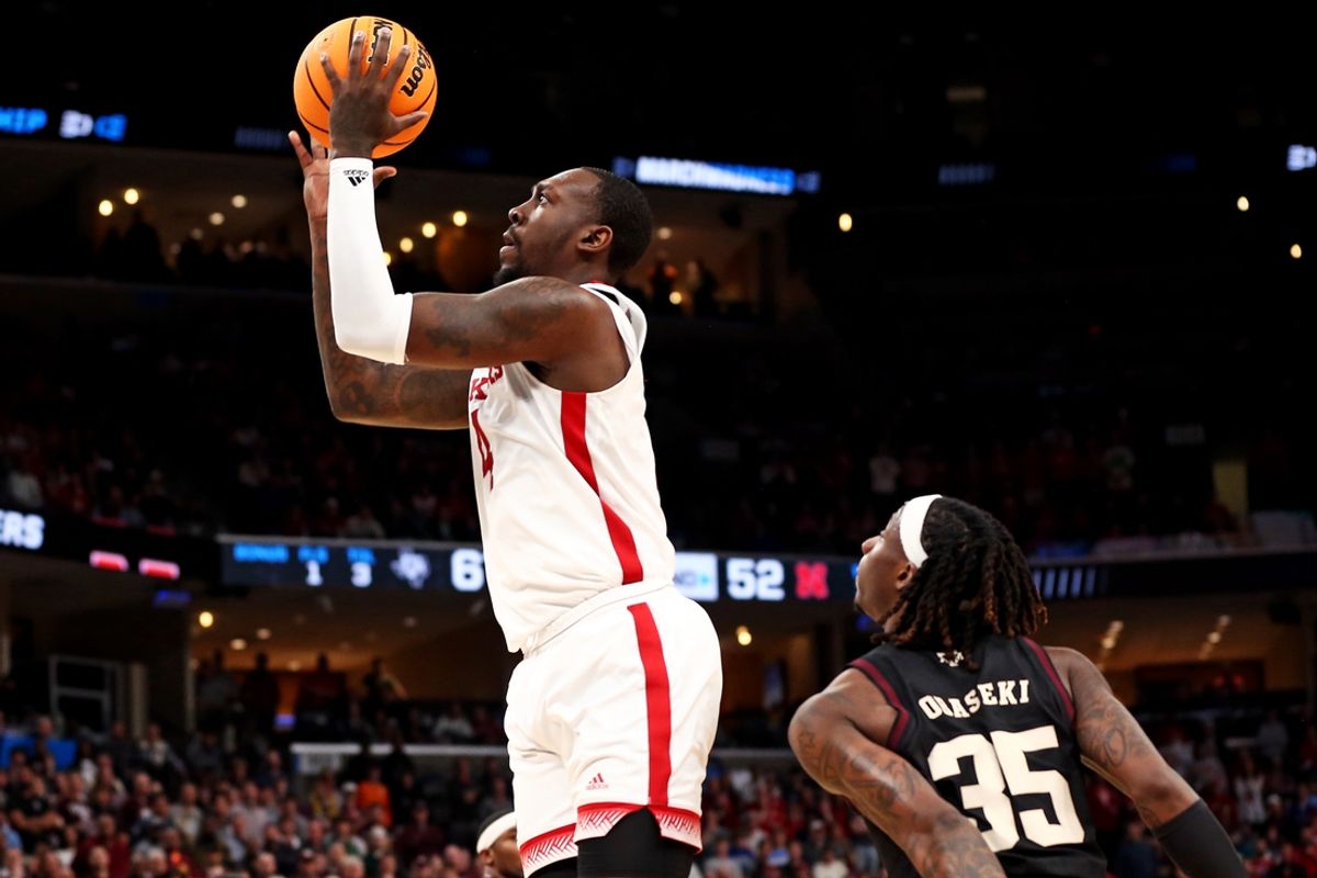 Mar 22, 2024; Memphis, TN, USA;  Nebraska Cornhuskers forward Juwan Gary (4) shoots the ball against Texas A&M Aggies guard Manny Obaseki (35) in the first round of the 2024 NCAA Tournament at FedExForum. Mandatory Credit: Petre Thomas-Imagn Images
