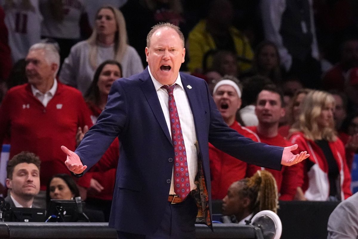 Mar 22, 2024; Brooklyn, NY, USA; Wisconsin Badgers head coach Greg Gard reacts against the James Madison Dukes in the first round of the 2024 NCAA Tournament at the Barclays Center.  Mandatory Credit: Robert Deutsch-Imagn Images