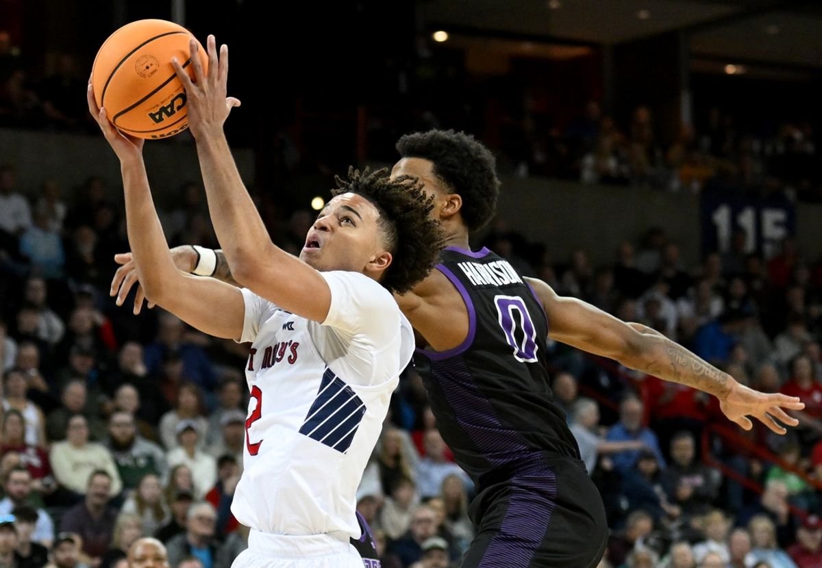 Mar 22, 2024; Spokane, WA, USA; St. Mary's Gaels guard Jordan Ross (2) drives against Grand Canyon Antelopes guard Ray Harrison (0) during the first half in the first round of the 2024 NCAA Tournament at Spokane Veterans Memorial Arena. Mandatory Credit: James Snook-Imagn Images