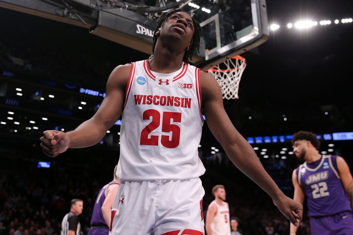 Mar 22, 2024; Brooklyn, NY, USA; Wisconsin Badgers guard John Blackwell (25) reacts against the James Madison Dukes in the first round of the 2024 NCAA Tournament at the Barclays Center. Mandatory Credit: Brad Penner-Imagn Images