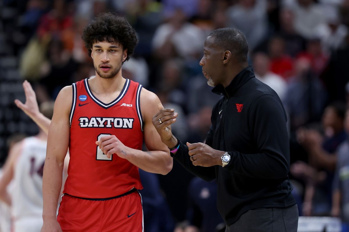 Mar 23, 2024; Salt Lake City, UT, USA; Dayton Flyers head coach Anthony Grant talks to forward Nate Santos (2) during the second half in the second round of the 2024 NCAA Tournament against the Arizona Wildcats at Vivint Smart Home Arena-Delta Center. Mandatory Credit: Rob Gray-Imagn Images