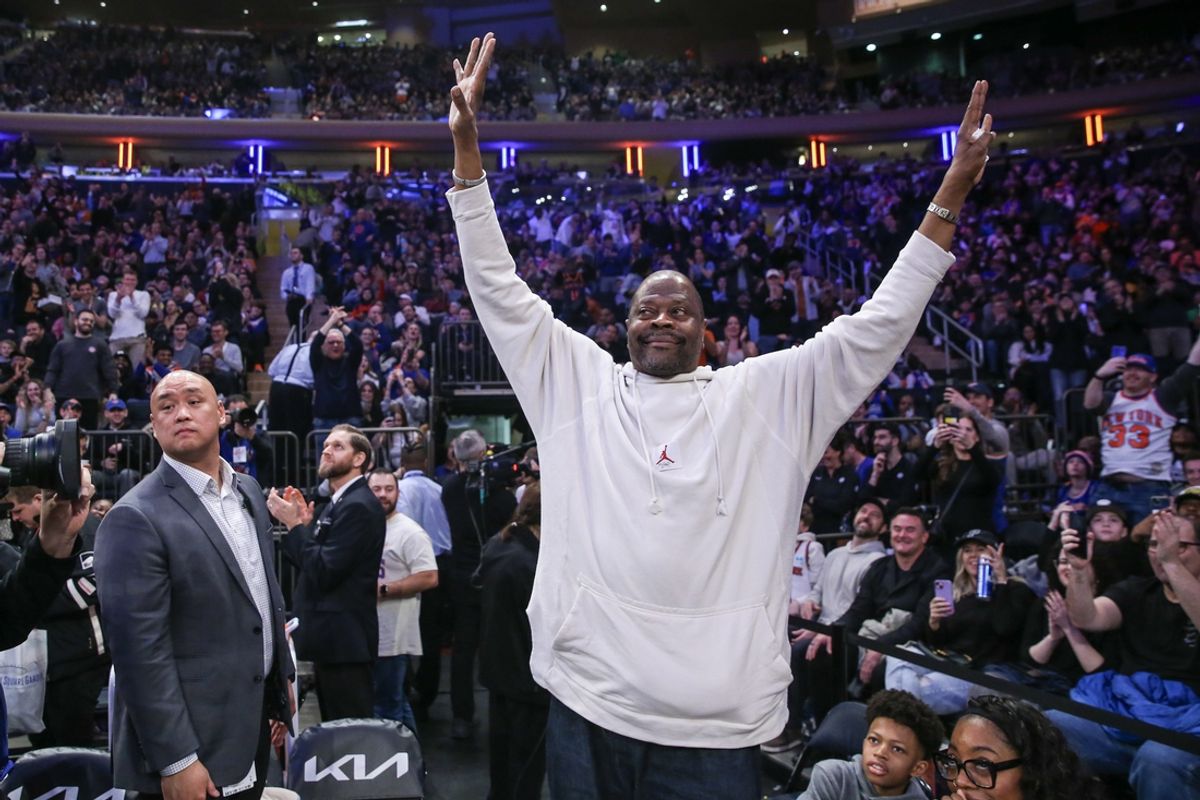 Mar 23, 2024; New York, New York, USA;  Former NBA center and Basketball Hall of Fame Member Patrick Ewing waves to the fans during a timeout at the game between the Brooklyn Nets and New York Knicks at Madison Square Garden. Mandatory Credit: Wendell Cruz-Imagn Images