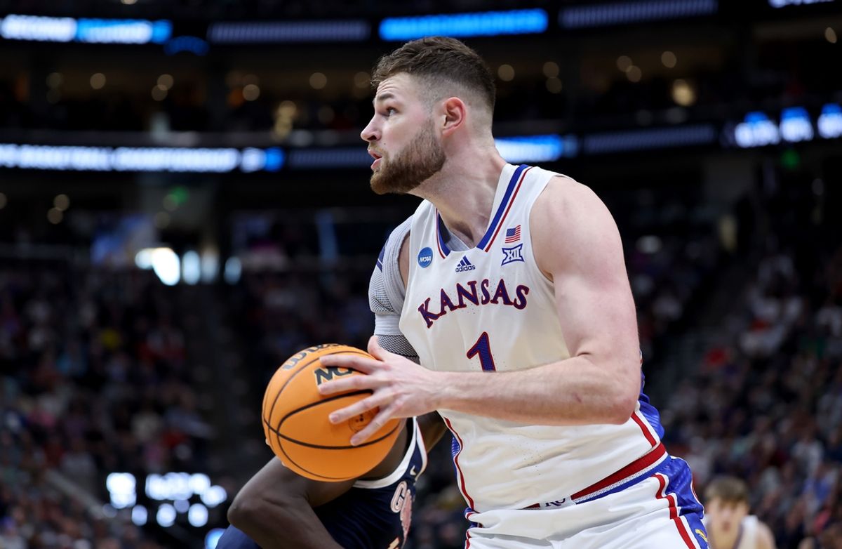 Mar 23, 2024; Salt Lake City, UT, USA; Kansas Jayhawks center Hunter Dickinson (1) drives during the second half in the second round of the 2024 NCAA Tournament against the Gonzaga Bulldogs at Vivint Smart Home Arena-Delta Center. Mandatory Credit: Rob Gray-Imagn Images