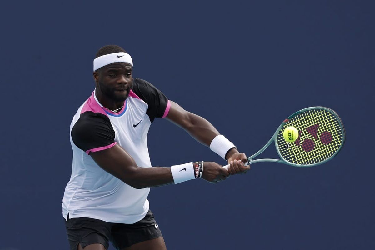 Mar 23, 2024; Miami Gardens, FL, USA; Frances Tiafoe (USA) hits a backhand against Christopher O'Connell (AUS) (not pictured) on day six of the Miami Open at Hard Rock Stadium. Mandatory Credit: Geoff Burke-USA TODAY Sports