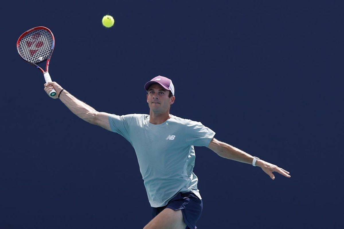 Mar 23, 2024; Miami Gardens, FL, USA; Tommy Paul (USA) reaches for a forehand against Martin Damm Jr. (USA) (not pictured) on day six of the Miami Open at Hard Rock Stadium. Mandatory Credit: Geoff Burke-USA TODAY Sports