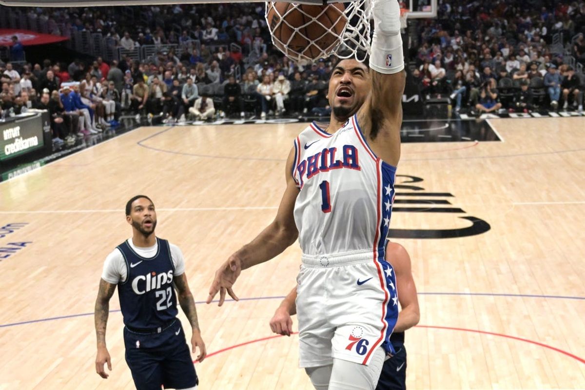 Mar 24, 2024; Los Angeles, California, USA;   Philadelphia 76ers forward KJ Martin (1) drives past Los Angeles Clippers guard Brandon Boston Jr. (4) for a dunk in the second half at Crypto.com Arena. Mandatory Credit: Jayne Kamin-Oncea-USA TODAY Sports