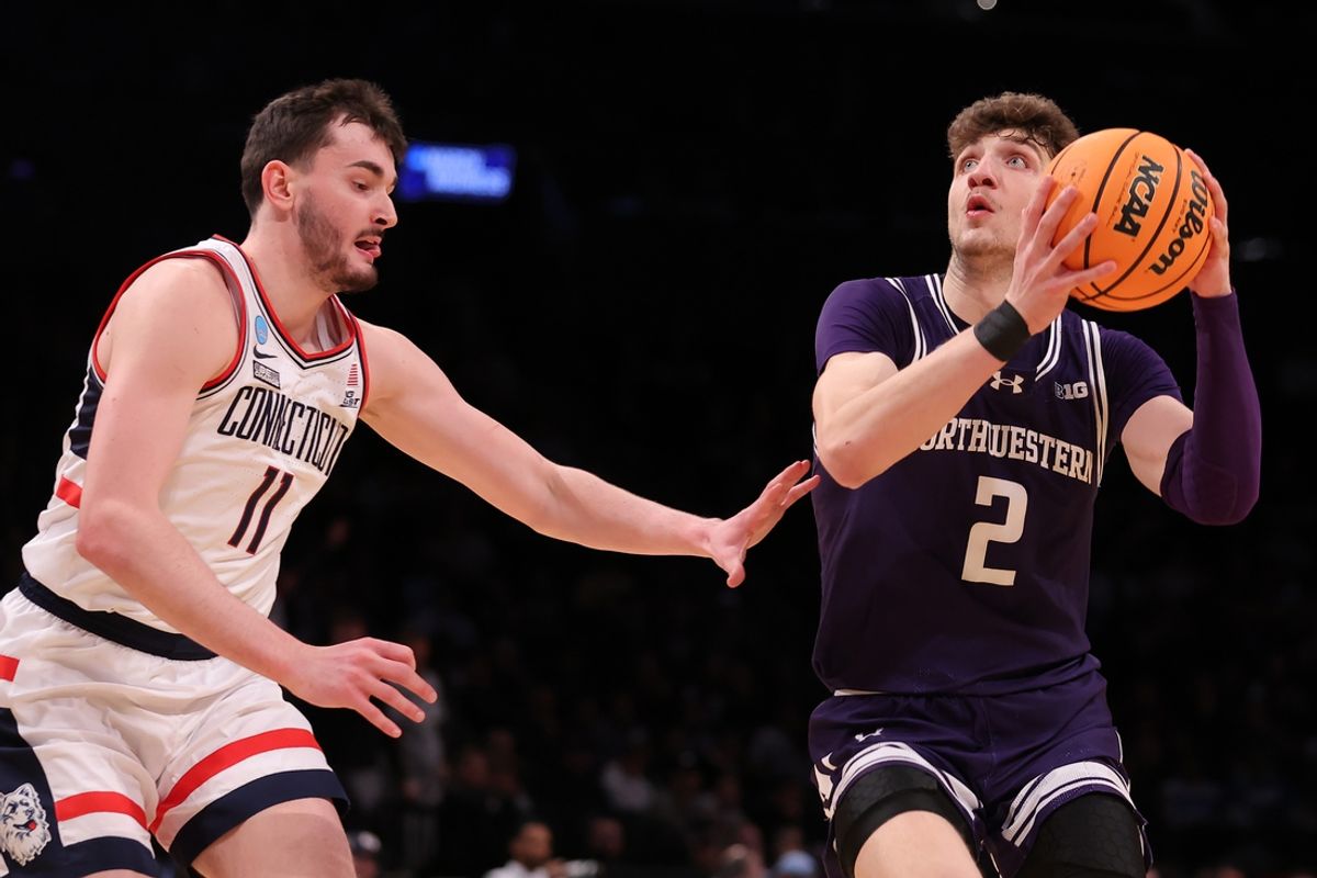 Mar 24, 2024; Brooklyn, NY, USA;Northwestern Wildcats forward Nick Martinelli (2) shoots the ball against Connecticut Huskies forward Alex Karaban (11) in the second round of the 2024 NCAA Tournament at the Barclays Center. Mandatory Credit: Brad Penner-Imagn Images