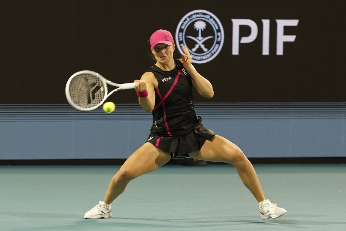 Mar 24, 2024; Miami Gardens, FL, USA; Iga Swiatek (POL) hits a forehand against Linda Noskova (CZE) (not pictured) on day seven of the Miami Open at Hard Rock Stadium. Mandatory Credit: Geoff Burke-USA TODAY Sports