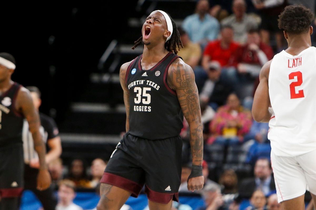 Texas A&M's Manny Obaseki (35) reacts after dunking the ball during the second round game between Texas A&M and the University of Houston in the 2024 NCAA Tournament at FedExForum in Memphis, Tenn., on Sunday, March 24, 2024.