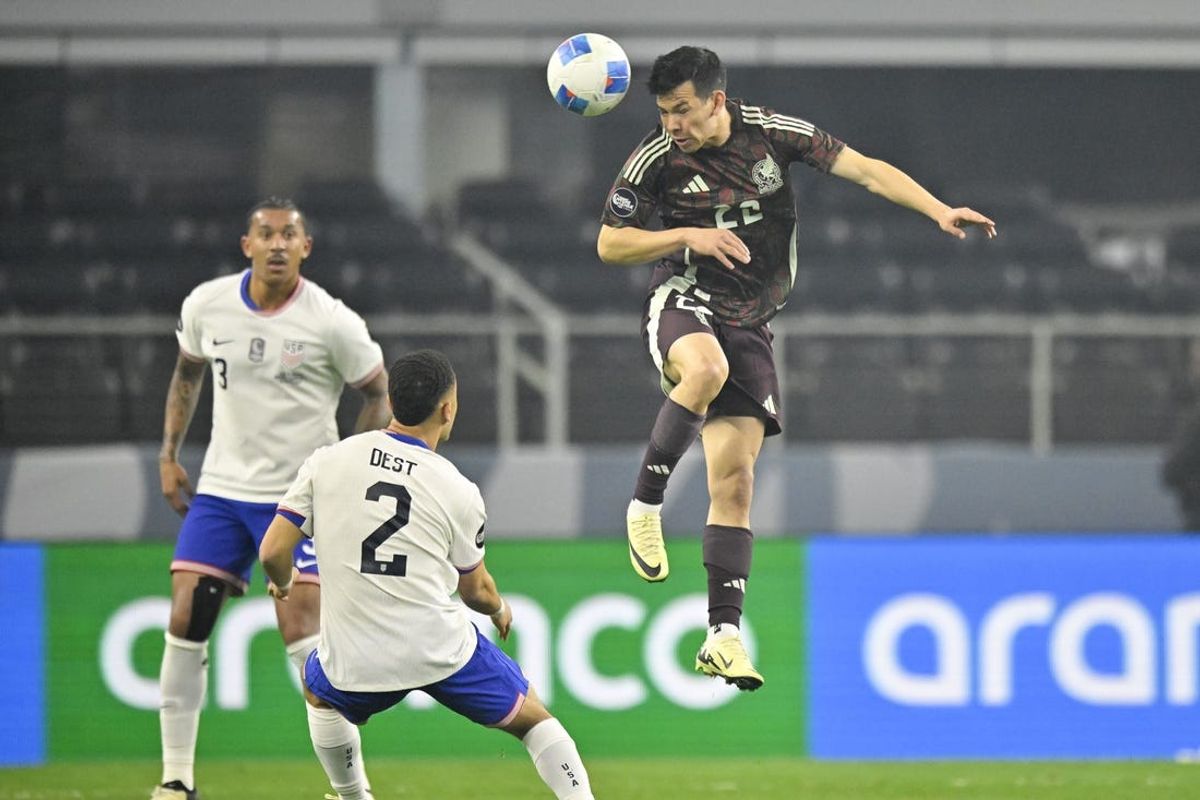 Mar 24, 2024; Arlington, Texas, USA; Mexico forward Hirving Lozano (22) heads the ball over United States defender Sergino Dest (2) during the first half at AT&T Stadium. Mandatory Credit: Jerome Miron-USA TODAY Sports