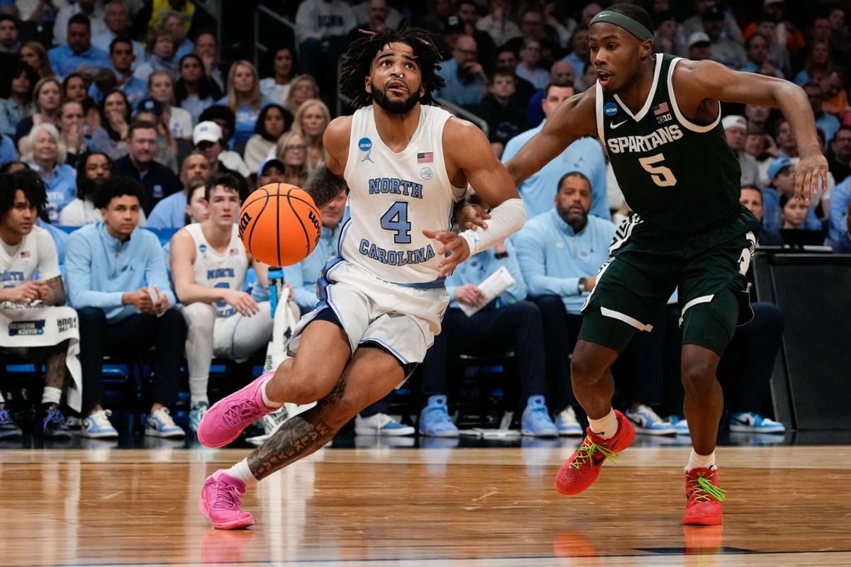 Mar 23, 2024; Charlotte, NC, USA; North Carolina Tar Heels guard RJ Davis (4) against Michigan State Spartans at Spectrum Center. Mandatory Credit: Jim Dedmon-Imagn Images