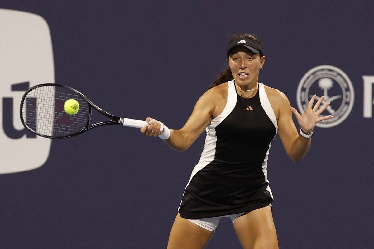 Mar 25, 2024; Miami Gardens, FL, USA; Jessica Pegula (USA) hits a forehand against Emma Navarro (USA) (not pictured) on day eight of the Miami Open at Hard Rock Stadium. Mandatory Credit: Geoff Burke-USA TODAY Sports
