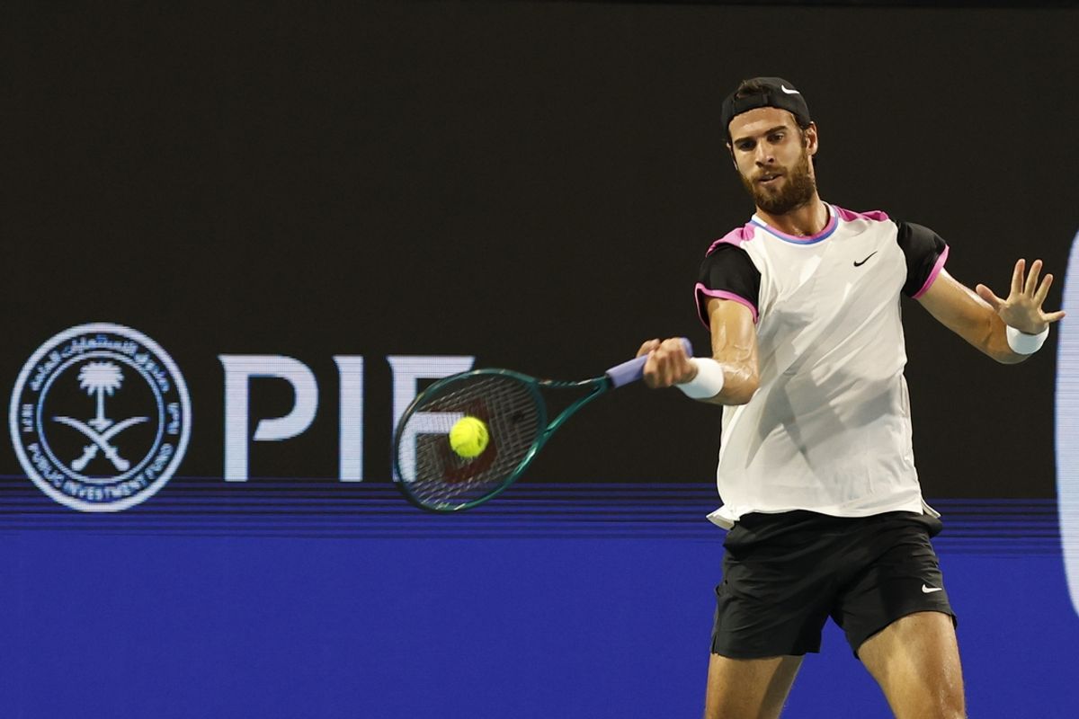 Mar 26, 2024; Miami Gardens, FL, USA; Karen Khachanov hits a forehand against Alexander Zverev (GER) (not pictured) on day nine of the Miami Open at Hard Rock Stadium. Mandatory Credit: Geoff Burke-Imagn Images