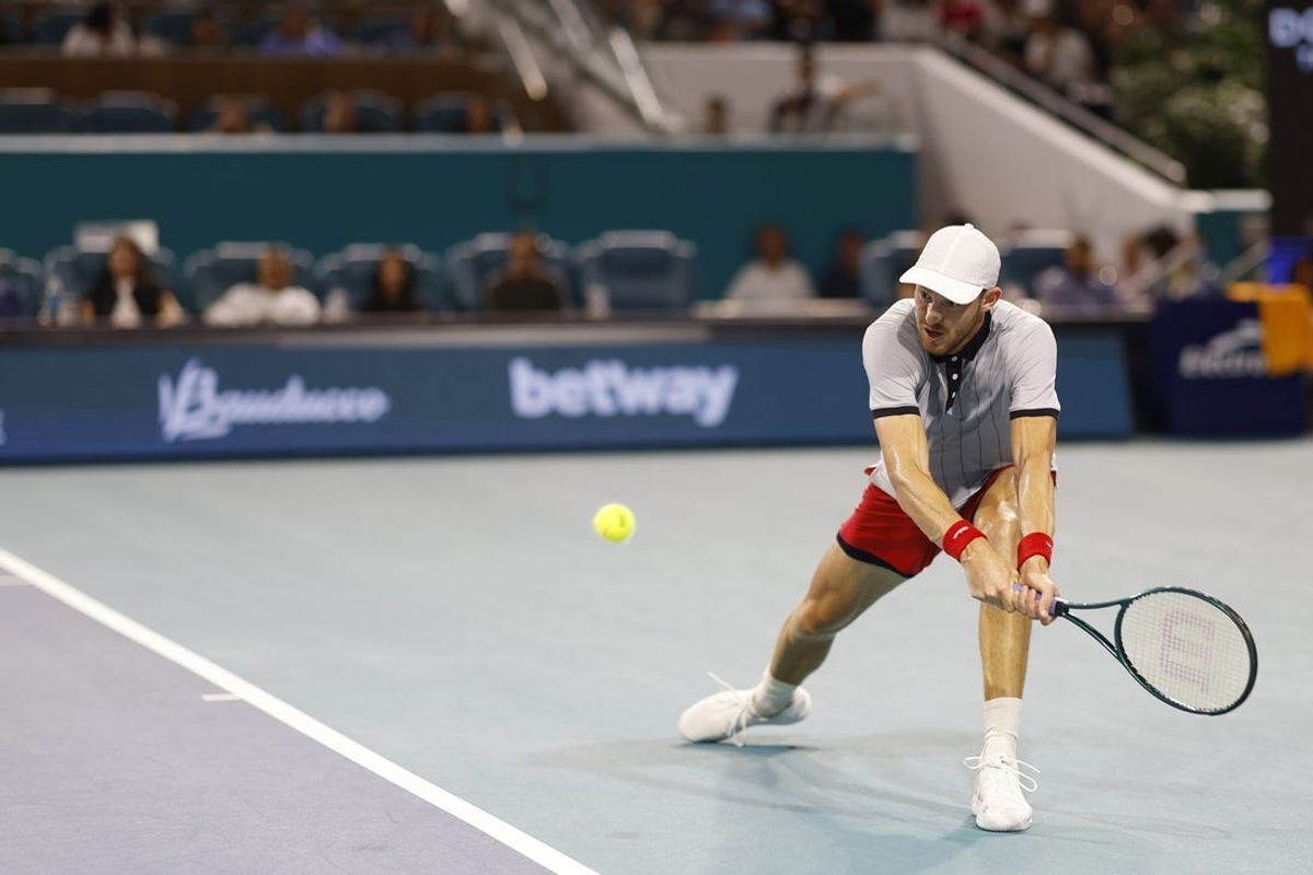 Mar 27, 2024; Miami Gardens, FL, USA; Nicolas Jarry (CHI) reaches for a backhand against Daniil Medvedev (not pictured) on day ten of the Miami Open at Hard Rock Stadium. Mandatory Credit: Geoff Burke-USA TODAY Sports