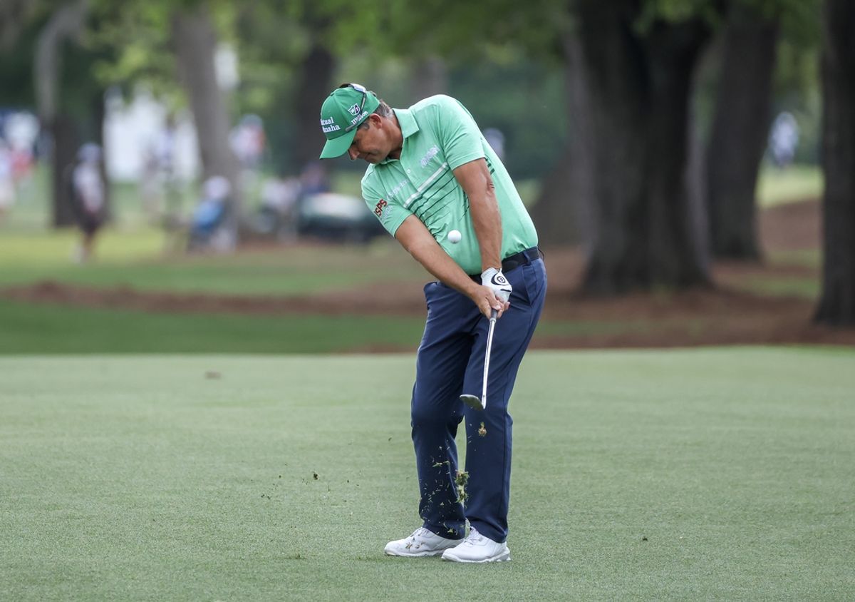 Mar 28, 2024; Houston, Texas, USA;  Padraig Harrington (IRE) hits his approach shot on the eighth fairway during the first round of the Texas Children's Houston Open golf tournament. Mandatory Credit: Thomas Shea-Imagn Images