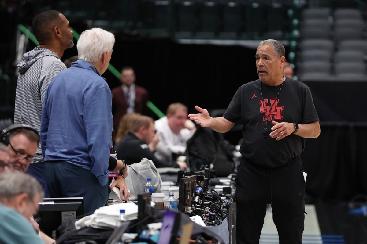 Mar 28, 2024; Dallas, TX, USA; Houston Cougars head coach Kelvin Sampson (R) talks to TV commentators Grant Hill (L) and Bill Raftery (C) during practice at American Airline Center. Mandatory Credit: Tim Heitman-USA TODAY Sports