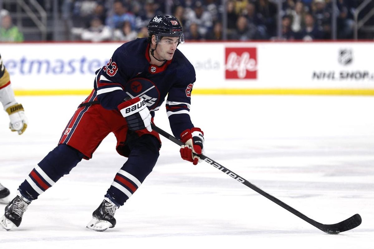 Mar 28, 2024; Winnipeg, Manitoba, CAN; Winnipeg Jets center Sean Monahan (23) skates through the neutral zone in the second period against the Vegas Golden Knights at Canada Life Centre. Mandatory Credit: James Carey Lauder-USA TODAY Sports