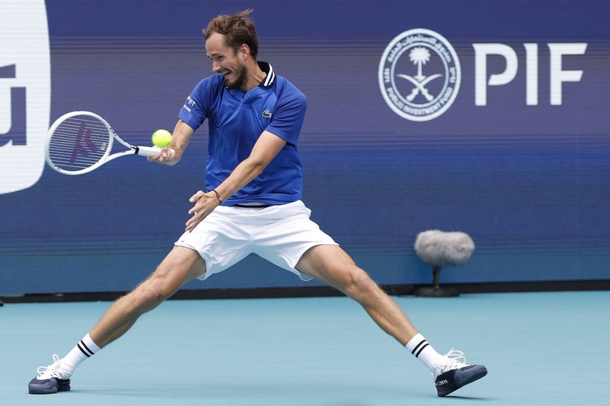 Mar 29, 2024; Miami Gardens, FL, USA; Daniil Medvedev hits a forehand against Jannik Sinner (ITA) (not pictured) in a men's singles semifinal of the Miami Open at Hard Rock Stadium. Mandatory Credit: Geoff Burke-Imagn Images