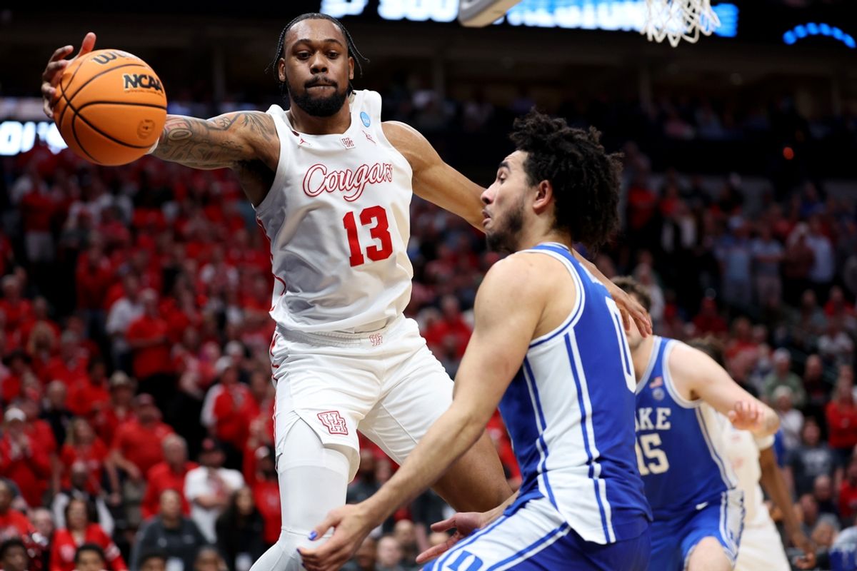 Mar 29, 2024; Dallas, TX, USA; Houston Cougars forward J'Wan Roberts (13) rebounds against Duke Blue Devils guard Jared McCain (0) during the second half in the semifinals of the South Regional of the 2024 NCAA Tournament at American Airlines Center. Mandatory Credit: Kevin Jairaj-Imagn Images