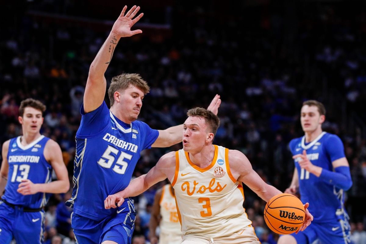 Tennessee guard Dalton Knecht (3) dribbles against Creighton guard Baylor Scheierman (55) during the second half of the NCAA tournament Midwest Regional Sweet 16 round at Little Caesars Arena in Detroit on Friday, March 29, 2024.