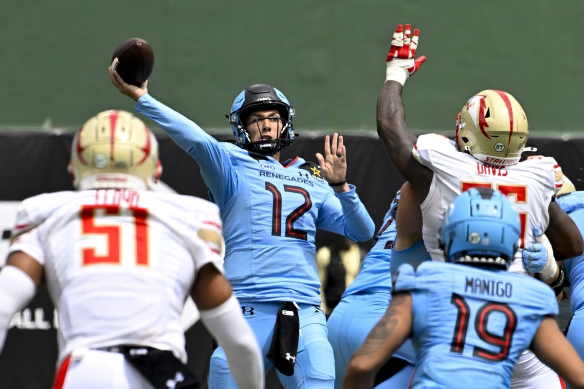 Mar 30, 2024; Arlington, TX, USA; Arlington Renegades quarterback Luis Perez (12) passes for a touchdown to wide receiver Isaiah Winstead (not pictured) during the first half against the Birmingham Stallions at Choctaw Stadium. Mandatory Credit: Jerome Miron-Imagn Images